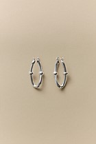 Signature Link Huggie Earrings